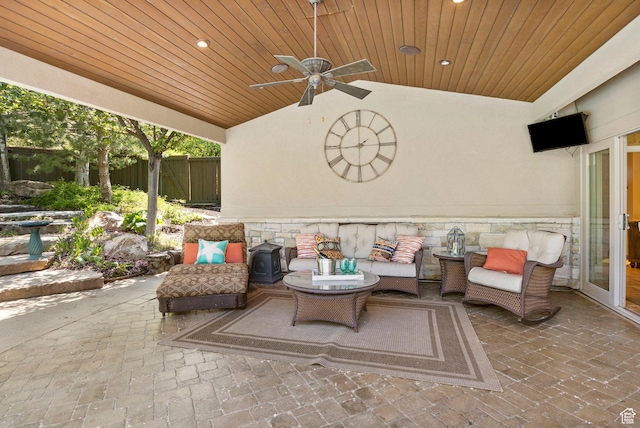 view of patio featuring an outdoor hangout area, ceiling fan, and fence