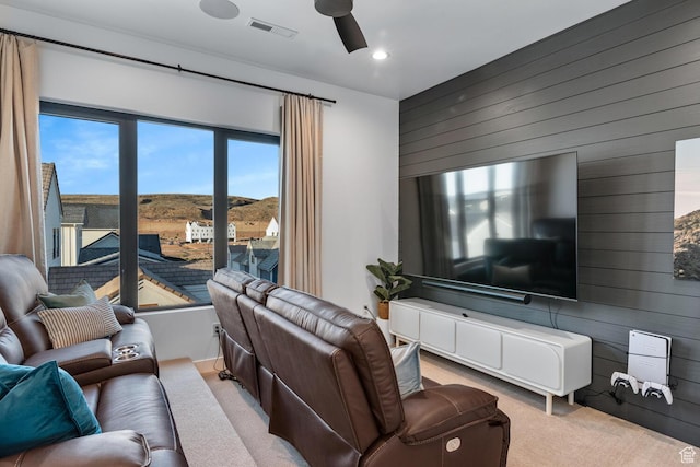 833 W Savoy Ln, St George, UT 84790 - carpeted living area with wooden walls, a ceiling fan, and recessed lighting