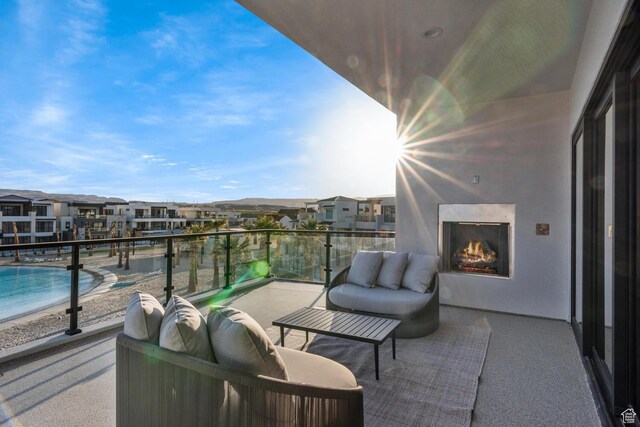 833 W Savoy Ln, St George, UT 84790 - balcony with a warm lit fireplace and a residential view