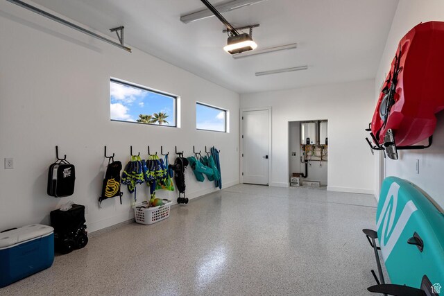833 W Savoy Ln, St George, UT 84790 - garage with a garage door opener and baseboards