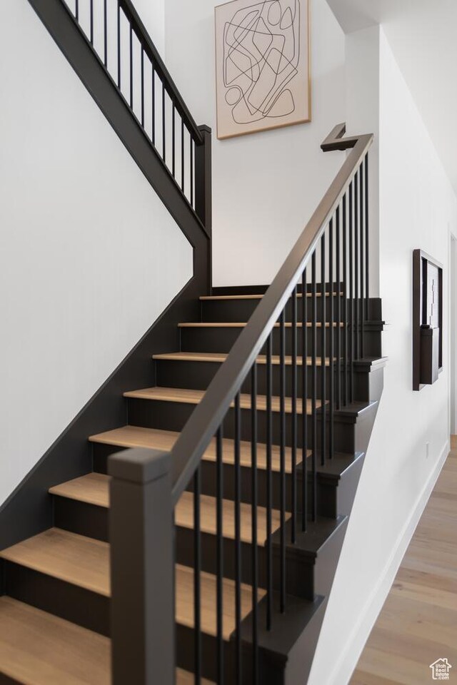 833 W Savoy Ln, St George, UT 84790 - staircase featuring wood finished floors and baseboards