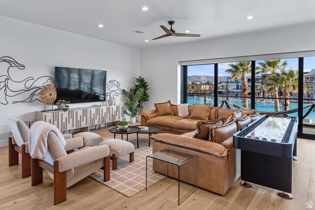 833 W Savoy Ln, St George, UT 84790 - living room with a ceiling fan, light wood-style flooring, and recessed lighting