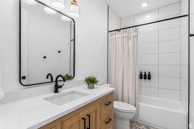 bathroom with toilet, vanity, shower / bathtub combination with curtain, and recessed lighting
