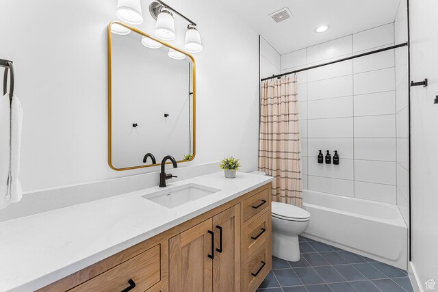 full bathroom featuring toilet, vanity, tile patterned floors, shower / bath combo with shower curtain, and recessed lighting