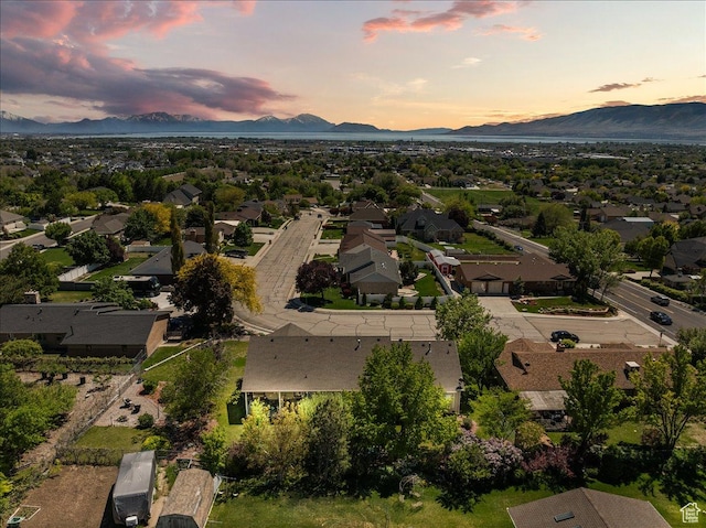 1243 E 1450 N, Lehi, UT 84043 - aerial view of property and surrounding area featuring mountains and nearby suburban area
