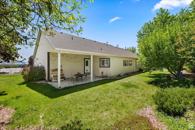 1243 E 1450 N, Lehi, UT 84043 - rear view of house featuring a patio area and a lawn