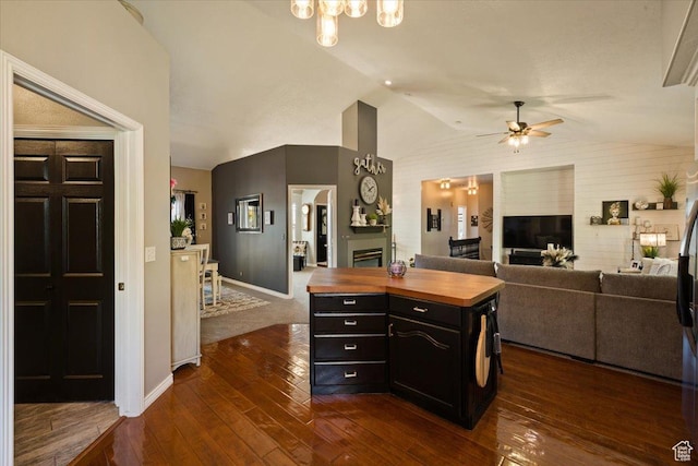1243 E 1450 N, Lehi, UT 84043 - kitchen with wood counters, a fireplace, open floor plan, vaulted ceiling, and a ceiling fan