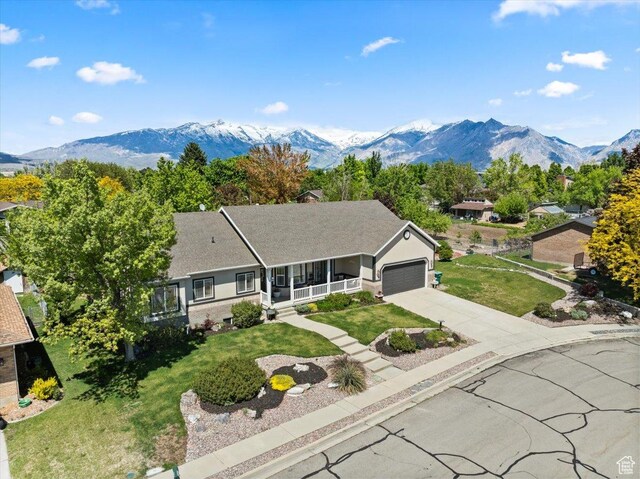 1243 E 1450 N, Lehi, UT 84043 - ranch-style house featuring covered porch, an attached garage, a mountain view, driveway, and a front yard
