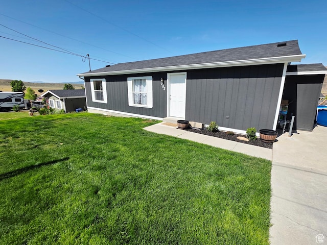 282 S Sheridan St, Stockton, UT 84071 - view of front facade with a front lawn