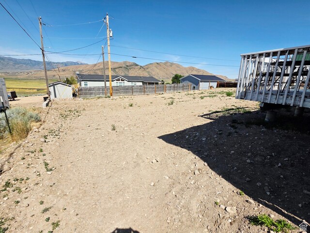 282 S Sheridan St, Stockton, UT 84071 - view of yard featuring a mountain view and a shed