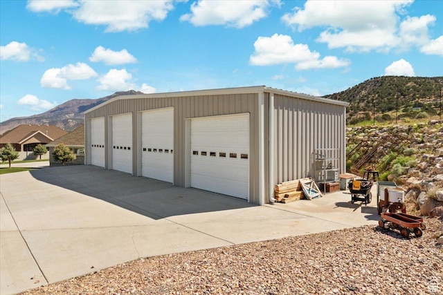 detached garage with a mountain view