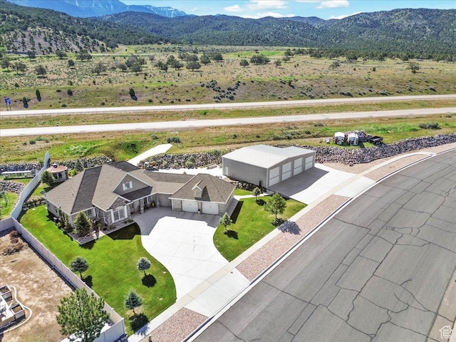view of subject property with mountains