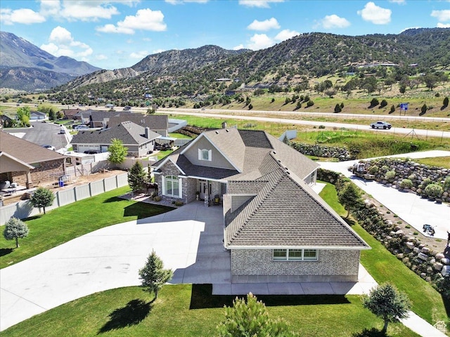 view of subject property featuring a mountainous background