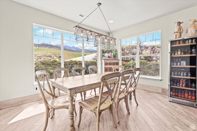 dining space with light wood-style floors