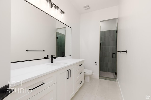 657 E Royal Dr, Washington, UT 84780 - full bath with toilet, tile patterned floors, a stall shower, vanity, and baseboards