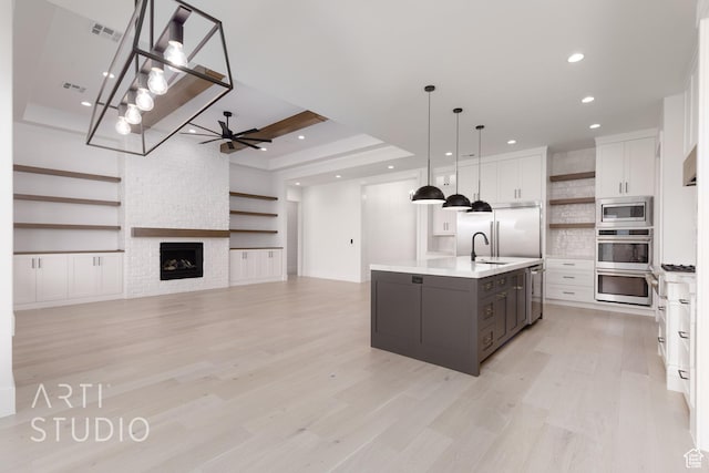 657 E Royal Dr, Washington, UT 84780 - kitchen with open shelves, built in appliances, white cabinetry, a ceiling fan, and recessed lighting