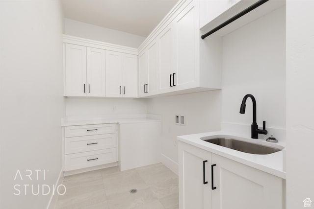 657 E Royal Dr, Washington, UT 84780 - clothes washing area with washer hookup, cabinet space, and baseboards