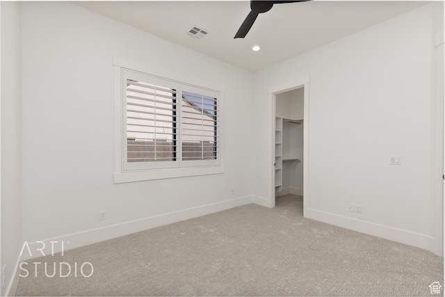 657 E Royal Dr, Washington, UT 84780 - unfurnished bedroom featuring carpet floors, baseboards, a walk in closet, recessed lighting, and a closet