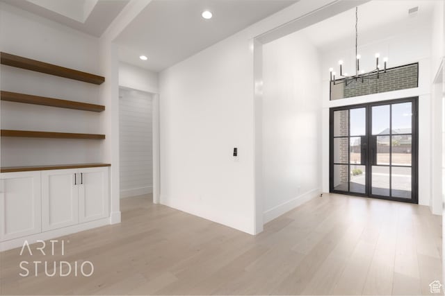 657 E Royal Dr, Washington, UT 84780 - unfurnished room featuring a chandelier, light wood-type flooring, french doors, baseboards, and recessed lighting