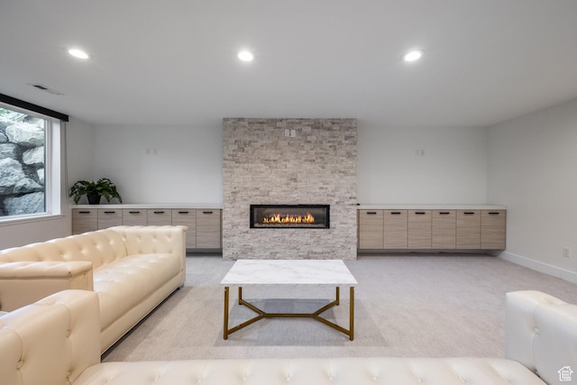 9969 S Altamont Dr E, Sandy, UT 84092 - living area featuring recessed lighting, light colored carpet, a fireplace, and baseboards
