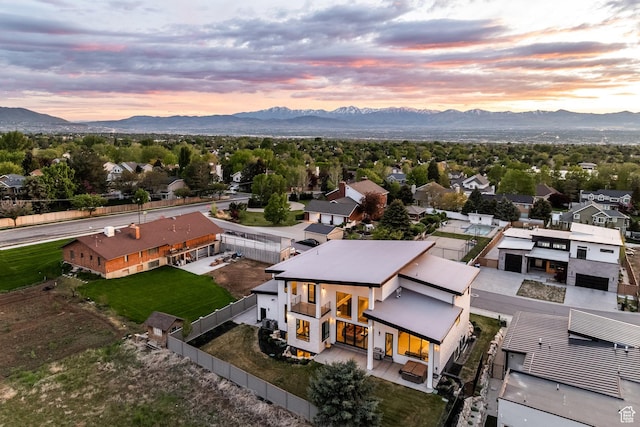9969 S Altamont Dr E, Sandy, UT 84092 - aerial view at dusk of a mountain view and a residential view