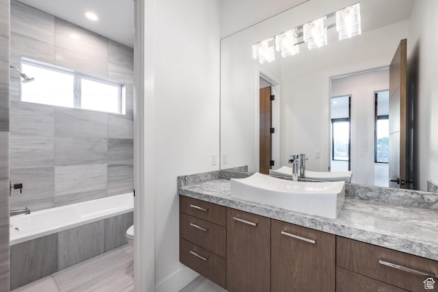 9969 S Altamont Dr E, Sandy, UT 84092 - full bathroom with toilet, healthy amount of natural light, vanity, and  shower combination