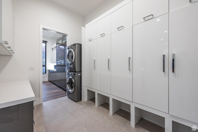 9969 S Altamont Dr E, Sandy, UT 84092 - washroom with estacked washer and dryer and cabinet space