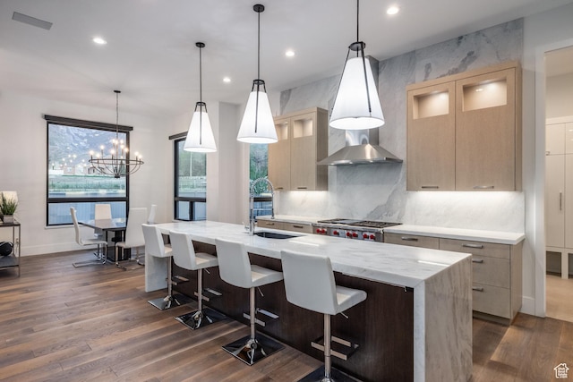 9969 S Altamont Dr E, Sandy, UT 84092 - kitchen with dark wood-style floors, recessed lighting, tasteful backsplash, a kitchen island with sink, and a kitchen bar