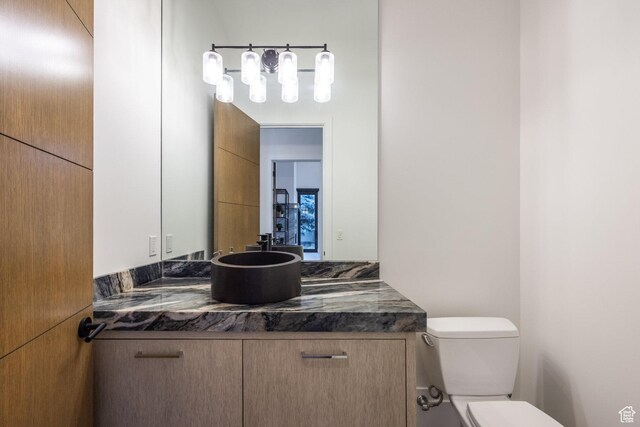 9969 S Altamont Dr E, Sandy, UT 84092 - bathroom with toilet and vanity