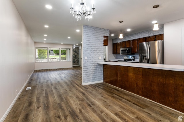 1950 S 200 W Unit B12, Bountiful, UT 84010 - kitchen with stainless steel appliances, dark wood finished floors, baseboards, open floor plan, and backsplash
