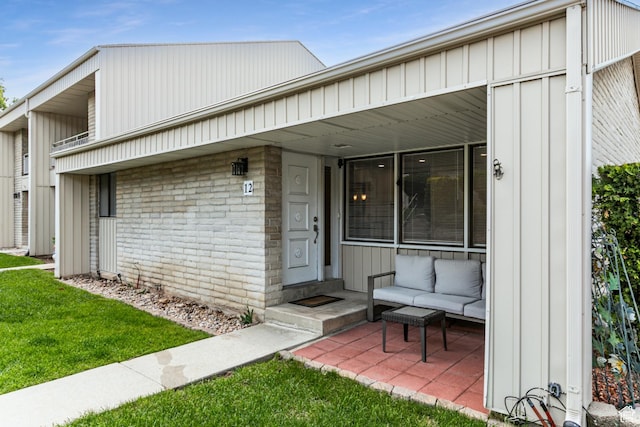 1950 S 200 W Unit B12, Bountiful, UT 84010 - view of front facade with board and batten siding and a front lawn
