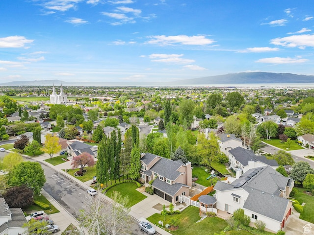 aerial perspective of suburban area featuring a mountainous background