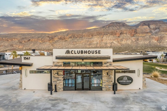 1450 W Torrey Pines Rd, Hurricane, UT 84737 - property at dusk featuring a mountain view