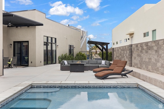view of pool featuring outdoor lounge area, a patio, and fence
