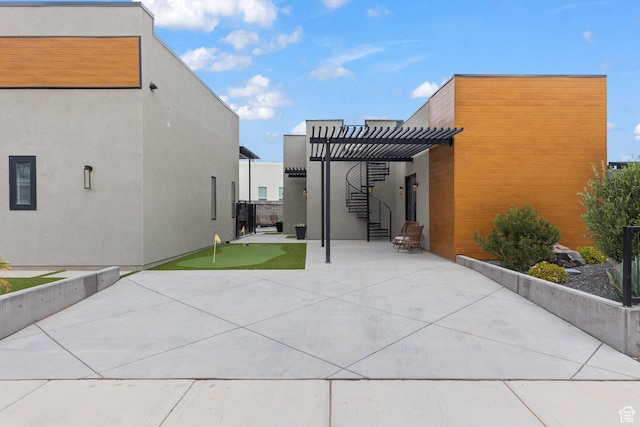 1450 W Torrey Pines Rd, Hurricane, UT 84737 - view of patio with a putting green and a pergola