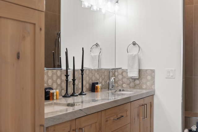 bathroom with decorative backsplash and vanity