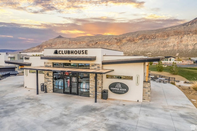 1450 W Torrey Pines Rd, Hurricane, UT 84737 - property at dusk featuring a mountain view