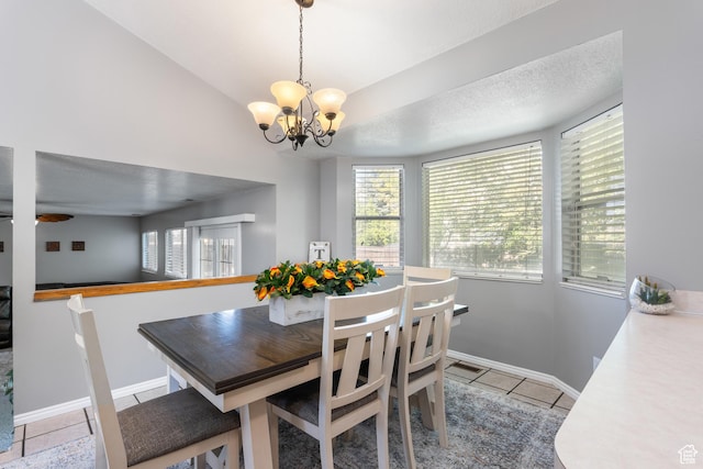 dining space with a chandelier, plenty of natural light, and baseboards