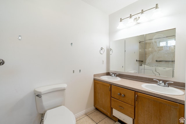 bathroom featuring toilet, tile patterned floors, an enclosed shower, and double vanity