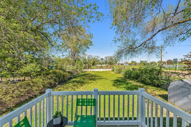 deck featuring a yard