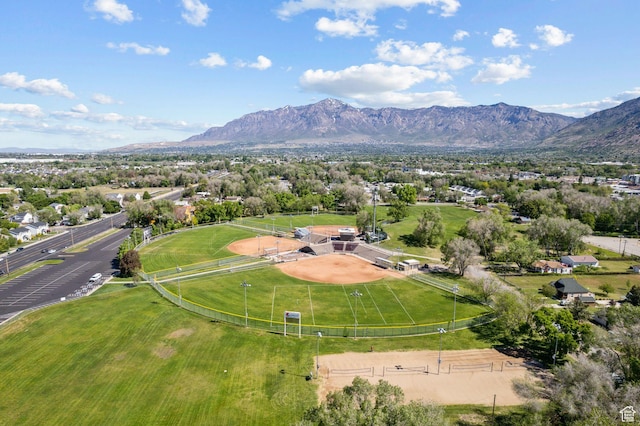 aerial view of property's location featuring a mountainous background