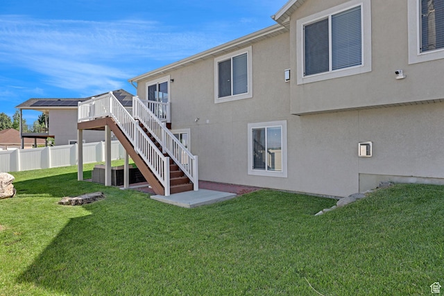 644 S 100 E, Willard, UT 84340 - back of property with a deck, stairway, and stucco siding