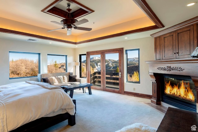 3623 Oakwood Ct, Park City, UT 84060 - bedroom featuring access to outside, a raised ceiling, multiple windows, recessed lighting, and a glass covered fireplace