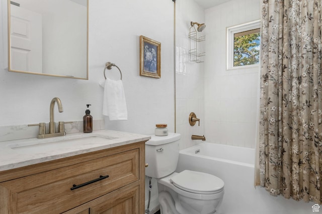bathroom featuring toilet, shower / bath combo with shower curtain, and vanity