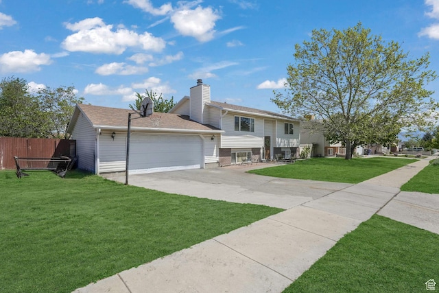 view of front of home featuring driveway, an attached garage, and brick siding