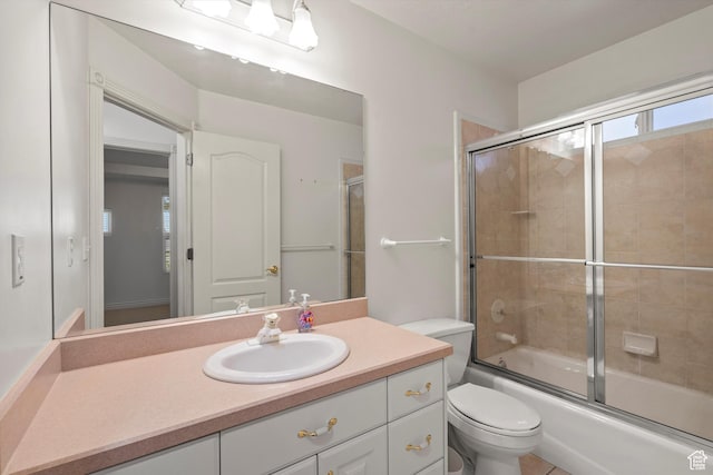 5280 S 1035 E, South Ogden, UT 84403 - bathroom with toilet, vanity, and enclosed tub / shower combo