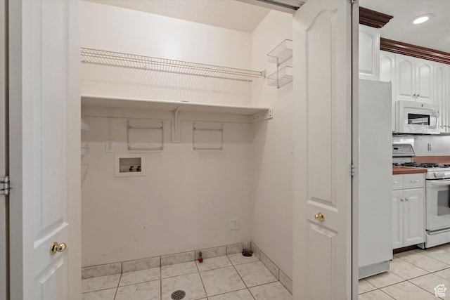5280 S 1035 E, South Ogden, UT 84403 - washroom featuring hookup for a washing machine, light tile patterned flooring, baseboards, and recessed lighting
