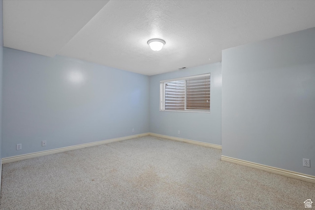 5280 S 1035 E, South Ogden, UT 84403 - empty room featuring carpet, baseboards, and a textured ceiling