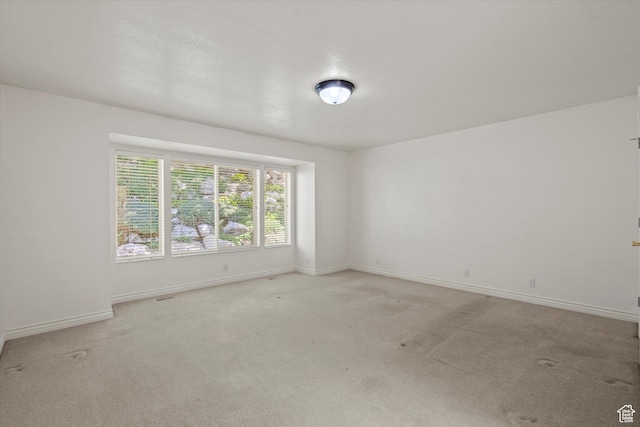 5280 S 1035 E, South Ogden, UT 84403 - empty room with light carpet and baseboards