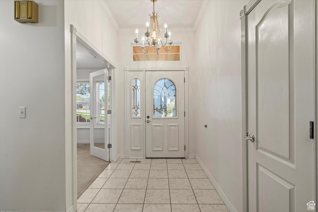 5280 S 1035 E, South Ogden, UT 84403 - foyer entrance with a chandelier, baseboards, ornamental molding, and light tile patterned floors
